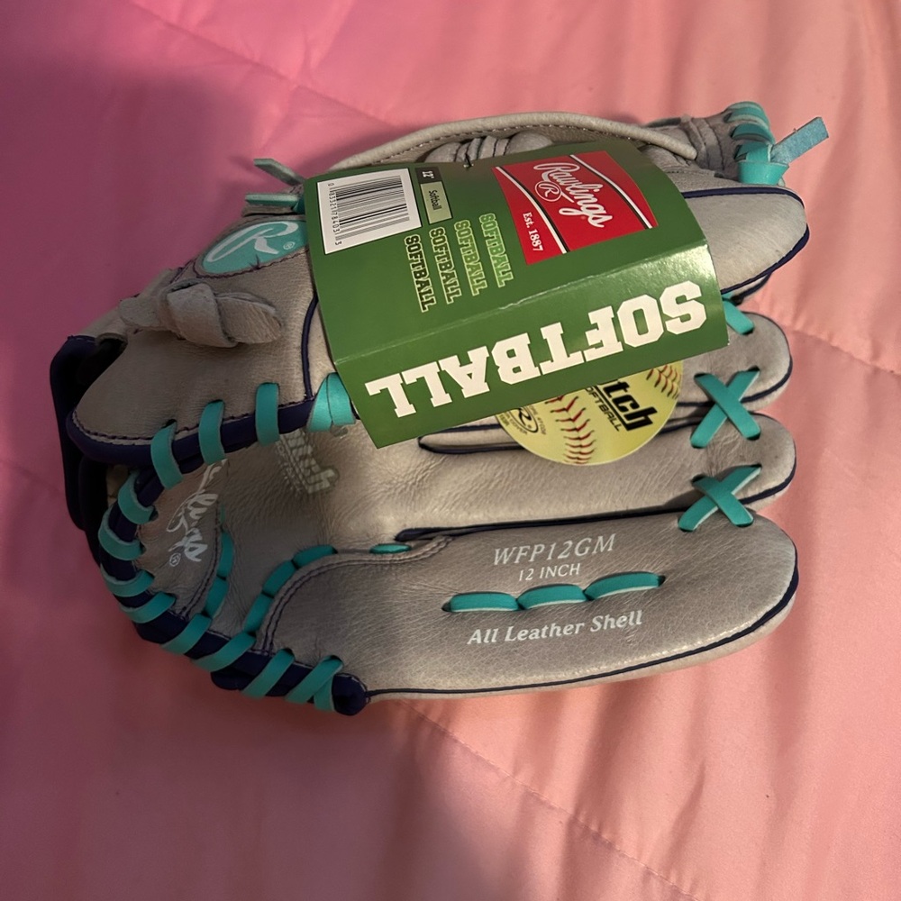 Rawlings children’s size left hand baseball mitt.